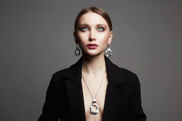fashion portrait of Beautiful sexy woman in jewelry