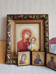 Fototapeta premium Orthodox icons on the shelf