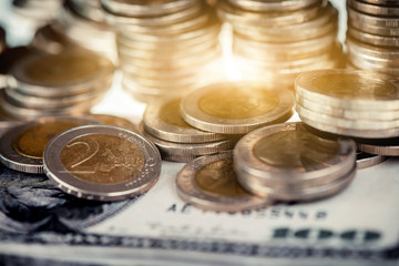 Stack of coins on black background, revenue or income money for invest and saving concept