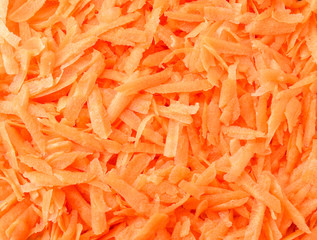 Grated carrot background. The view from the top