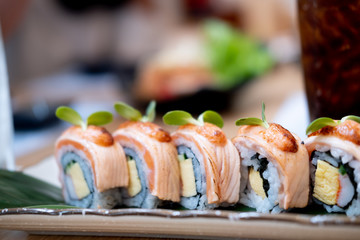 Close up and selective focus of salmon sushi roll maki