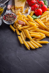 concept of traditional italian pasta with tomatoes and basil