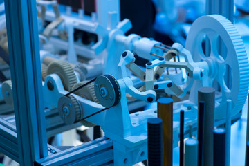 Many plastic cogwheels and gears, smart manufacturing background