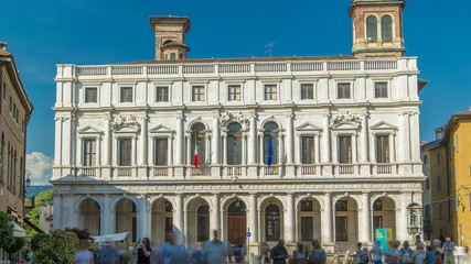 Main square piazza Vecchia in an Italian town Bergamo timelapse. Library and historic buildings.