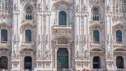 Entrance to Duomo cathedral timelapse. Front view with people walking on square