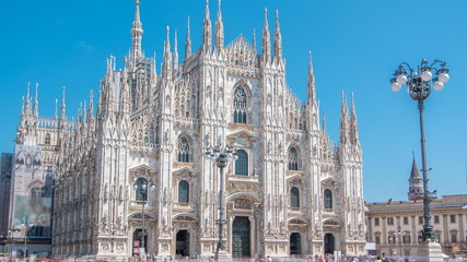 The Duomo cathedral timelapse. Front view with people walking on square