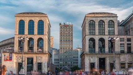 Fototapeta premium View of Skyscraper and Museo del Novecento timelapse from Piazza del Duomo in Milan, Italy