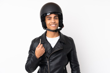 Young handsome man with a motorcycle helmet over isolated white background