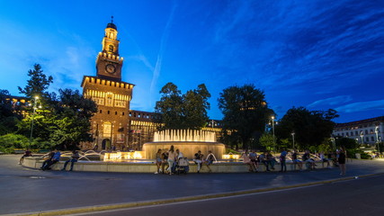 Main entrance to the Sforza Castle and tower - Castello Sforzesco day to night timelapse, Milan,...