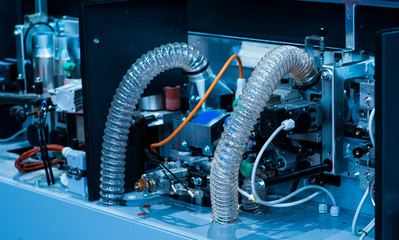 Fototapeta premium CNC milling machine. Milling and engraving installation. CNC woodworking machine. Machine for high-quality milling and engraving of surfaces of parts.