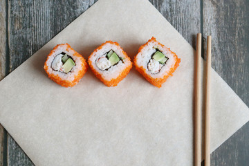 Fresh sushi rolls close up, top view