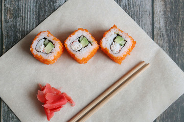 Fresh sushi rolls close up, top view