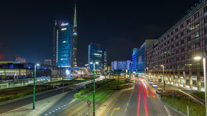 Milan skyline with modern skyscrapers in Porta Nuova business district night timelapse  in Milan, Italy