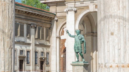 Obraz premium Monument to Roman emperor Constantine I timelapse in Milan, in front of San Lorenzo Maggiore basilica.