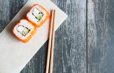 Fresh sushi rolls close up, top view