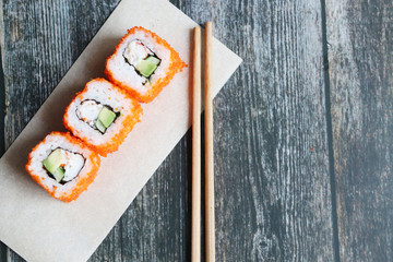 Fresh sushi rolls close up, top view