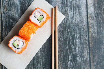 Fresh sushi rolls close up, top view