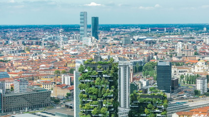 Milan aerial view of modern towers and skyscrapers and the Garibaldi railway station in the business district timelapse