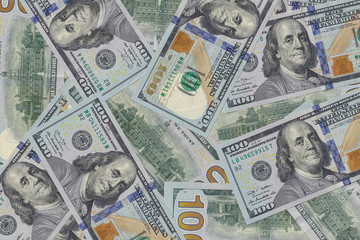 Fototapeta na wymiar Hundred dollar bills or banknotes background. American money full background close-up and flat lay. High detail usd background and texture.