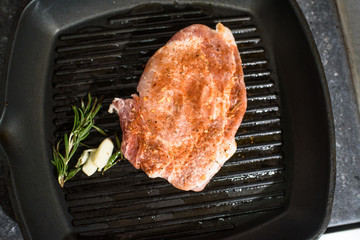 Cooking grilled pork loin. Tasty and hearty food. Cooking for restaurant guests