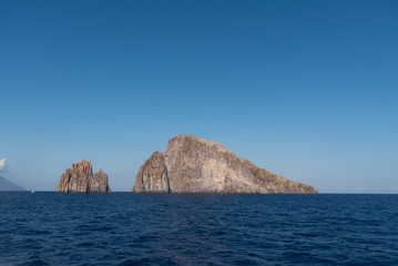 Fototapeta na wymiar Eolian island, landscape with rocks close to Stromboli volcano, Sicily Italy