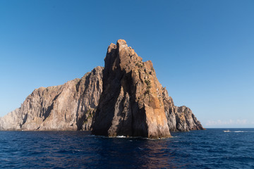 Fototapeta na wymiar Eolian island, landscape with rocks close to Stromboli volcano, Sicily Italy