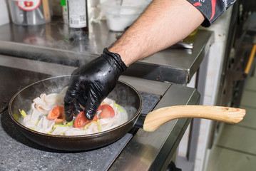 The process of roasting squid. Delicious seafood.