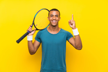African American tennis player man pointing up a great idea