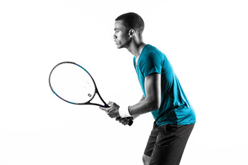 Afro American tennis player man over isolated white background .