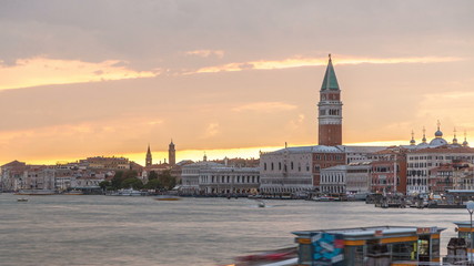 View of the Doge's Palace and the Campanile of St. Mark's Cathedral at sunset timelapse. Venice, Italy