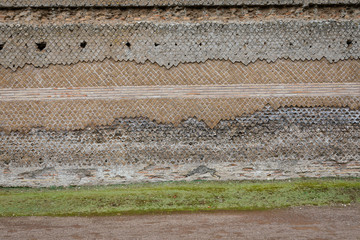 Abstract authentic pattern of the ancient stone pattern. Wall of the typical italian colours, great texture