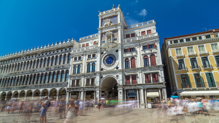 St Mark's Clock tower timelapse  on Piazza San Marco, facade, Venice, Italy.