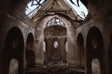 Ruins of the old church near Lviv, Ukraine. Ancient columns, ruined altar, and broken roof. Concept...