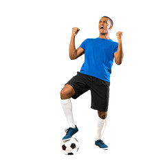 Full-length shot of African American football player man over isolated white background