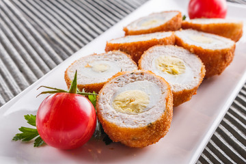 Scotch egg meat balls on rustic wooden background