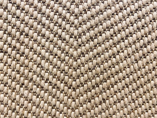 Close-up of a natural carpet in line pattern textile for background and texture.