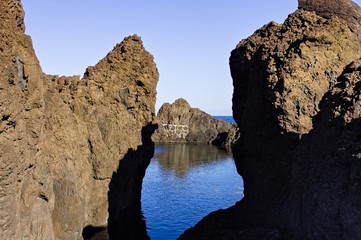 Natural pool with black volcanic rock in the Atlantic Ocean (Madeira, Portugal, Europe)