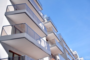 Fototapeta premium New building condominium. Modern apartment complex exterior.