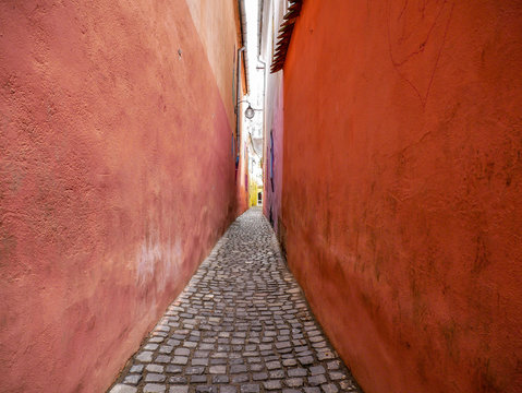The colorful  Rope Street  ( in Romanian Strada Sforii) on medieval streets in Transylvania, Brasov city, one of the narrowest streets in Europe.