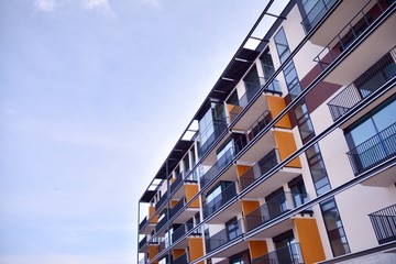 New building condominium. Modern apartment complex exterior.