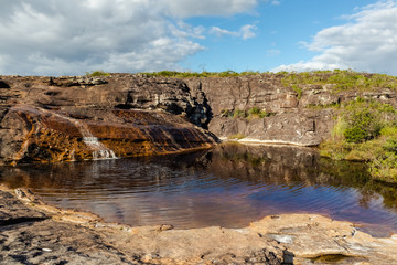 Fototapeta na wymiar Lajeado waterfall, with its large lake, Milho Verde, Serro district, Minas Gerais, Brazil