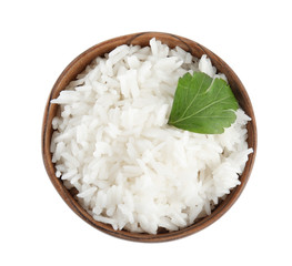 Wooden bowl with cooked rice and parsley isolated on white, top view