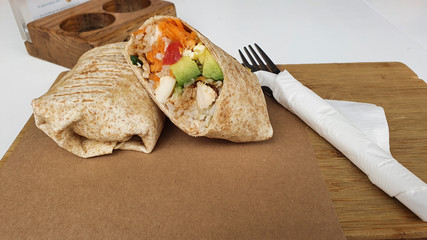 A sandwich from South Africa with rice and chicken