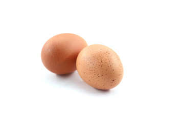 Two eggs isolated on white background