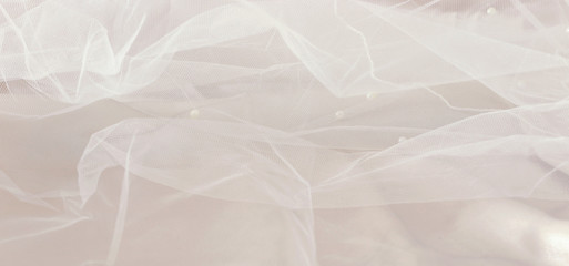 Vintage white tulle chiffon texture background. wedding concept