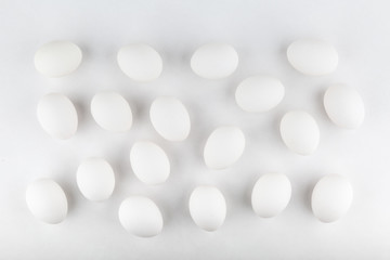 pattern of chicken eggs on white background