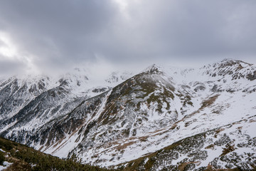 Partly snowy mountains with cloudy sky, slovakia low tatras, polana © Martin