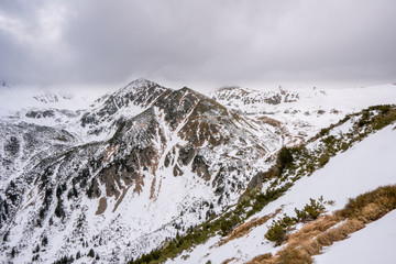 Partly snowy mountains with cloudy sky, slovakia low tatras, polana © Martin