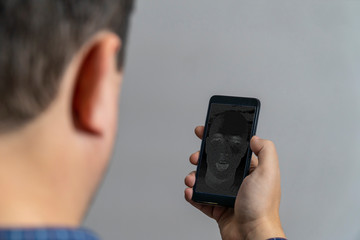 Person looking at a personal assistant bot on a phone