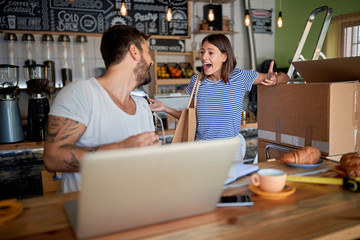 Opening  own business.Man and woman as business partners working.